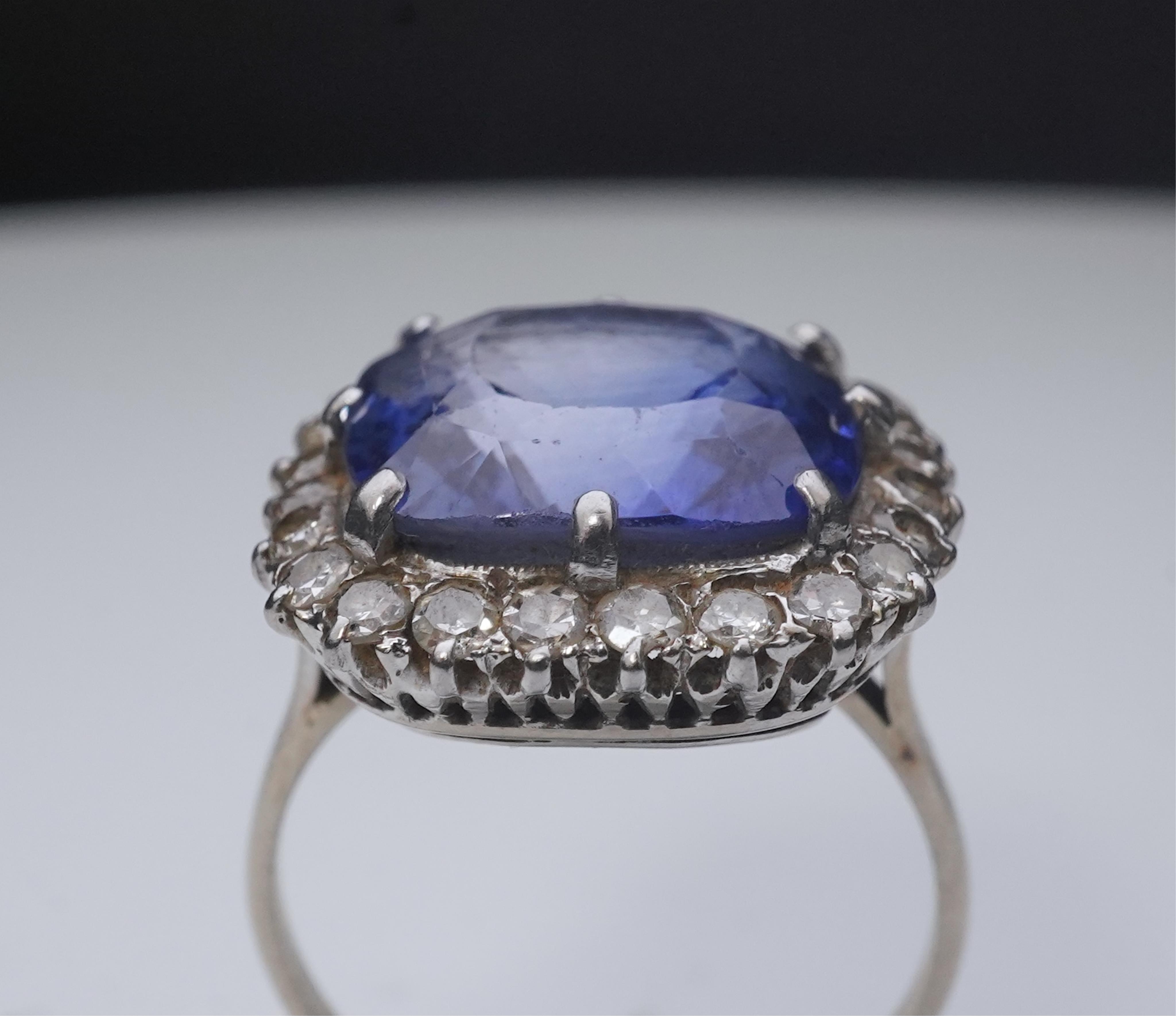 A synthetic sapphire and diamond cluster ring, early 20th century